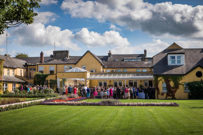 Bride and groom in hotel gardens