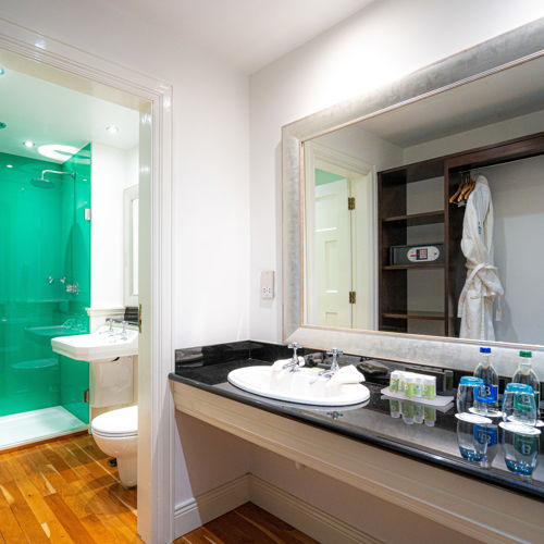 Elegant en-suite bathroom at Dunraven Hotel accommodation in Adare