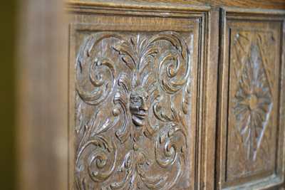 Close up of intricate wooden engravings at the Dunrave Hotel