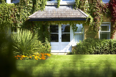 Double doors into the garden at luxury acommodation at Dunraven Hotel